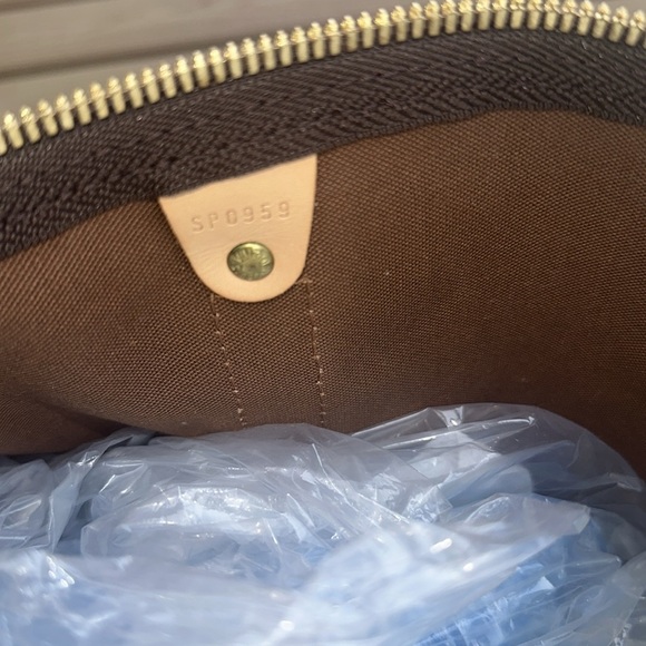 Louis Vuitton Monogram Canvas Duffel with Tan Accents - Picture 11 of 11